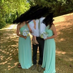 I am selling 2 matching bridesmaid dresses.